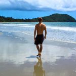 Man walking on beach