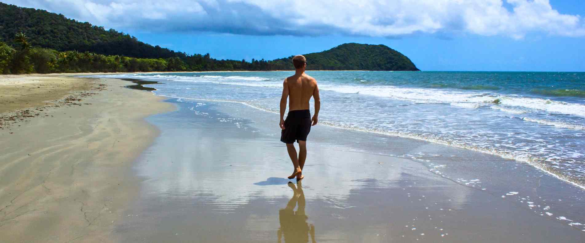 Man walking on beach