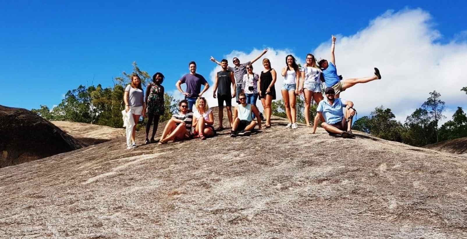 Tour group standing on rock